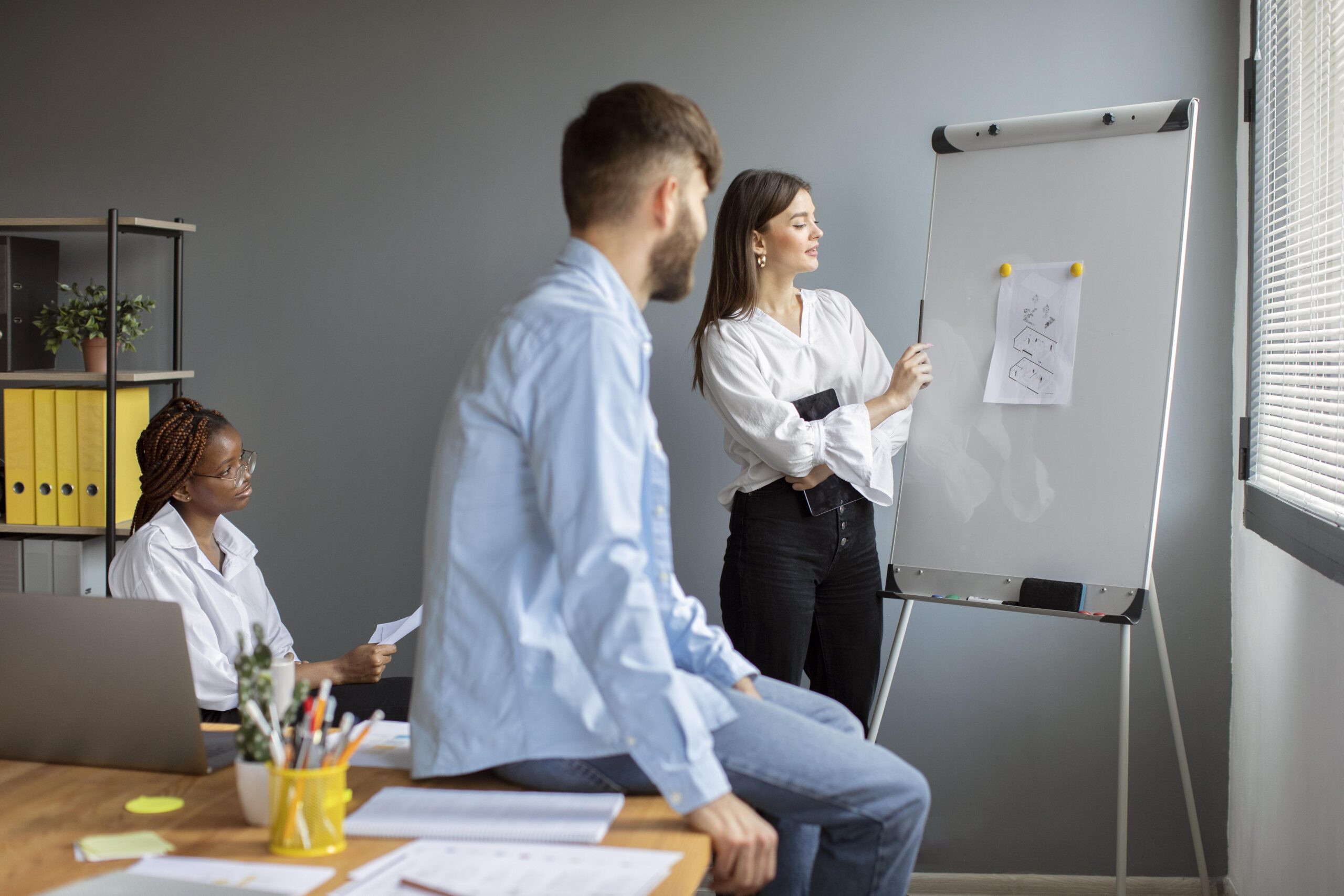 https://workwisecareercoaching.com/wp-content/uploads/2025/02/young-people-working-together-startup-company-scaled.jpg